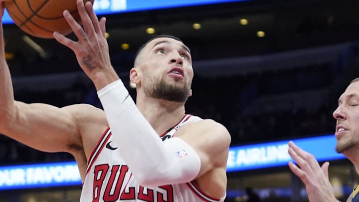 Jan 14, 2025; Chicago, Illinois, USA; New Orleans Pelicans center Daniel Theis (10) defends Chicago Bulls guard Zach LaVine (8) during the second half at United Center. Mandatory Credit: David Banks-Imagn Images