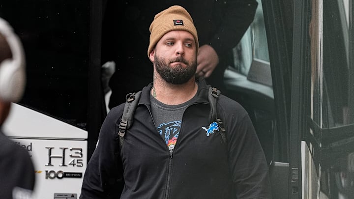 Detroit Lions offensive tackle Taylor Decker (68) walks off the bus as the team arrive at Lambeau Field 