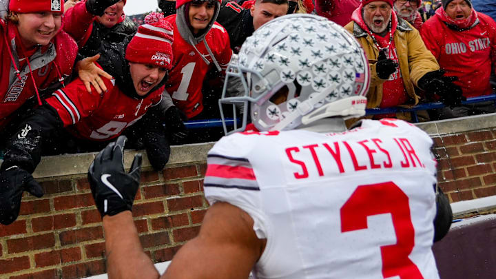 Ohio State Buckeyes cornerback Lorenzo Styles Jr. (3) celebrates with fans in the second half of the NCAA football game at Michigan Stadium on Saturday, Nov. 29, 2025 in Ann Arbor, Michigan.