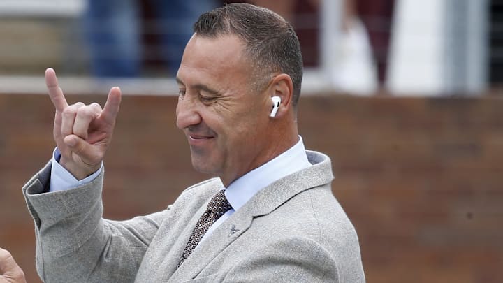 Texas Longhorns head coach Steve Sarkisian does the “horns up” sign prior to the game against the Mississippi State Bulldogs at Davis Wade Stadium at Scott Field.