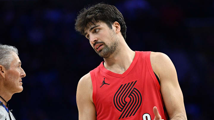 Mar 15, 2026; Philadelphia, Pennsylvania, USA; Portland Trail Blazers forward Deni Avdija (8) talks with referee referee Scott Foster (48) against the Philadelphia 76ers during the first half at Xfinity Mobile Arena. Mandatory Credit: Eric Hartline-Imagn Images