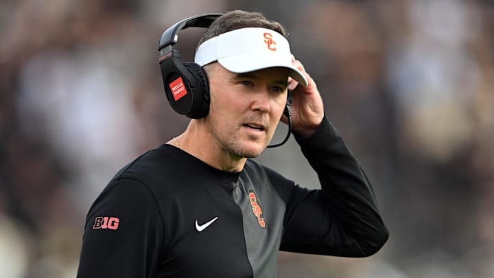 Sep 13, 2025; West Lafayette, Indiana, USA; Southern California Trojans head coach Lincoln Riley stands on the sidelines during the first quarter against the Purdue Boilermakers at Ross-Ade Stadium. Mandatory Credit: Marc Lebryk-Imagn Images