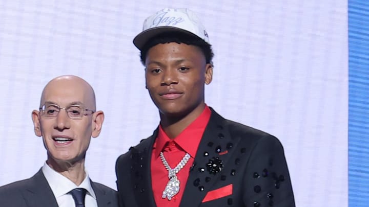 Jun 25, 2025; Brooklyn, NY, USA;  Ace Bailey stands with NBA commissioner Adam Silver after being selected as the fifth pick by the Utah Jazz in the first round of the 2025 NBA Draft at Barclays Center. Mandatory Credit: Brad Penner-Imagn Images