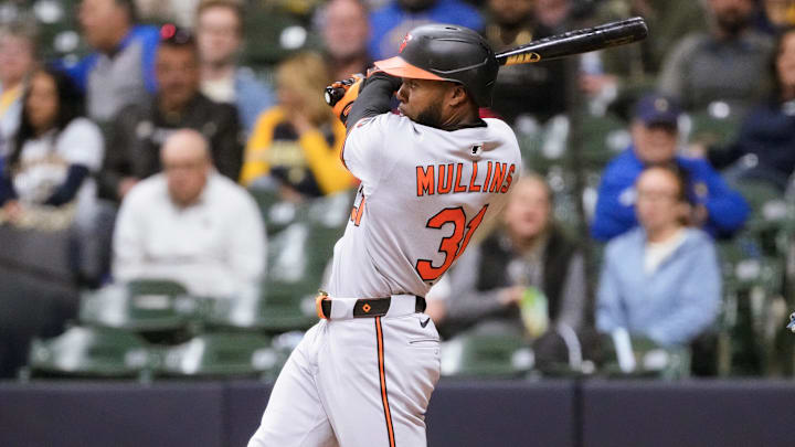 May 19, 2025; Milwaukee, Wisconsin, USA;  Baltimore Orioles center fielder Cedric Mullins (31) hits a home run during the seventh inning against the Milwaukee Brewers at American Family Field.