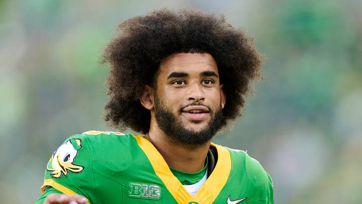 Sep 18, 2026; Eugene, Oregon, USA; Oregon Ducks quarterback Dante Moore (5) waves to a fan before a game against the Portland State Vikings at Autzen Stadium. Mandatory Credit: Troy Wayrynen-Imagn Images