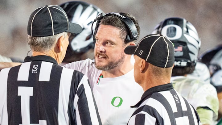 Oregon Ducks Wisconsin Badgers Iowa Hawkeyes Jordon Davison Dante Moore Indiana Hoosiers College Football Playoff seed bracket