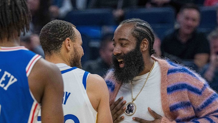 Philadelphia 76ers guard James Harden (1) and Golden State Warriors guard Stephen Curry (30) talk at Chase Center. 