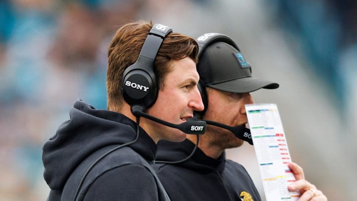 Jan 4, 2026; Jacksonville, Florida, USA; Jacksonville Jaguars offensive coordinator Grant Udinski and head coach Liam Coen during the second quarter against the Tennessee Titans at EverBank Stadium. Mandatory Credit: Morgan Tencza-Imagn Images