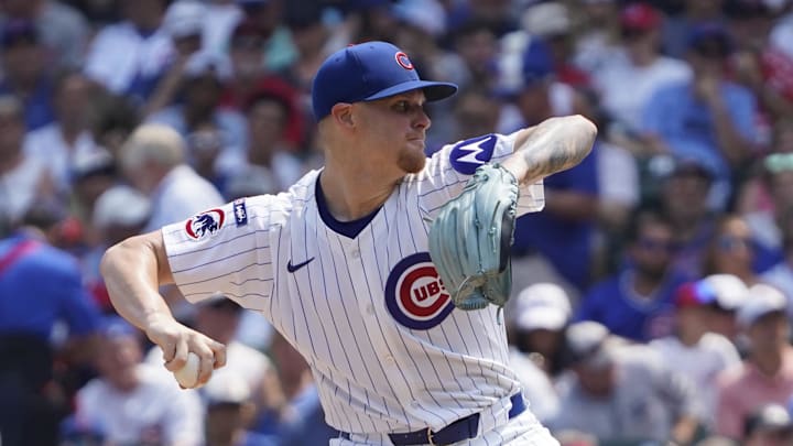 Aug 6, 2025; Chicago, Illinois, USA; Chicago Cubs pitcher Cade Horton (22) throws the ball against the Cincinnati Reds during the first inning at Wrigley Field. 