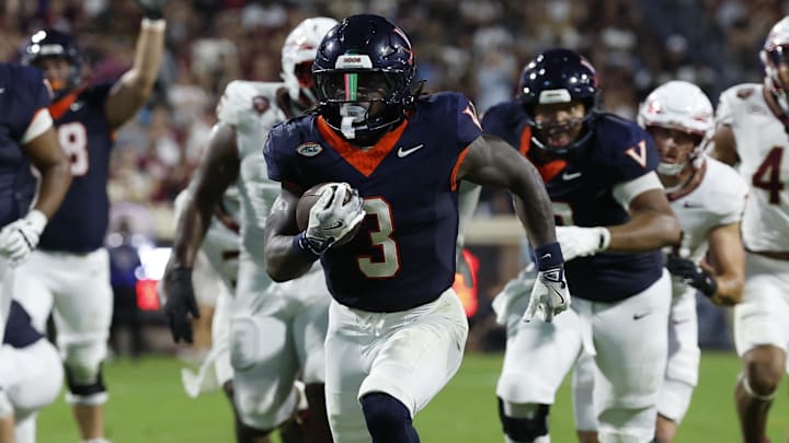 Sep 26, 2025; Charlottesville, Virginia, USA; Virginia Cavaliers running back J'Mari Taylor (3) scores a touchdown against the Florida State Seminoles during the second quarter at Scott Stadium. Mandatory Credit: Geoff Burke-Imagn Images