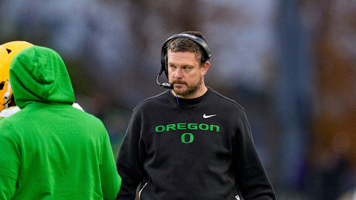 Oregon head coach Dan Lanning walks off the field after a timeout as the Oregon Ducks take on the Washington Huskies on Nov. 29, 2025, at Husky Stadium in Seattle, Washington.