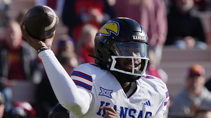 Kansas Jayhawks quarterback Jalon Daniels (6) passes the ball against Iowa State 