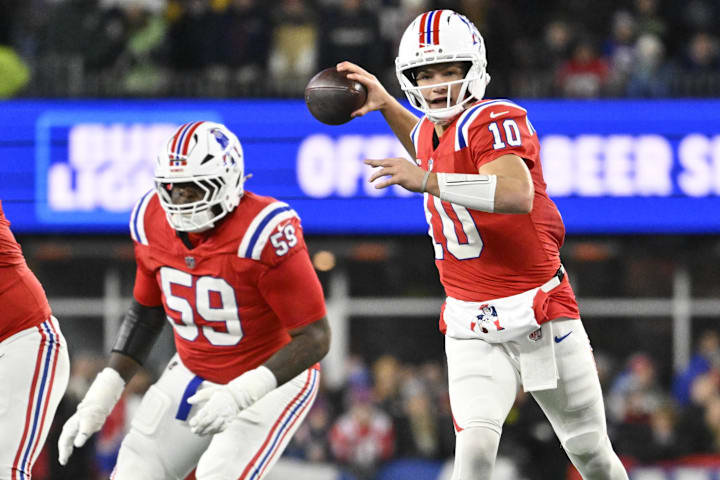 Dec 1, 2025; Foxborough, Massachusetts, USA; New England Patriots quarterback Drake Maye (10) throws a pass during the second