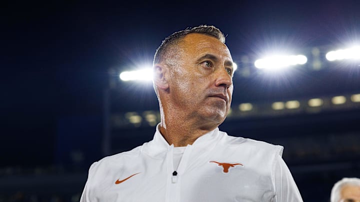 Texas Longhorns head coach Steve Sarkisian is interviewed by the media after the game against the Kentucky Wildcats at Kroger Field. Texas Longhorns head coach Steve Sarkisian is interviewed by the media after the game against the Kentucky Wildcats at Kroger Field.