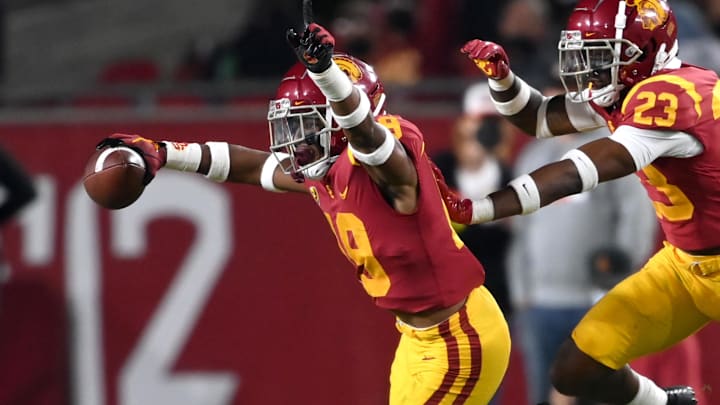Sep 25, 2021; Los Angeles, California, USA; USC Trojans linebacker Raesjon Davis (9) celebrates after an interception in the second half of the game at United Airlines Field at Los Angeles Memorial Coliseum. Mandatory Credit: Jayne Kamin-Oncea-Imagn Images