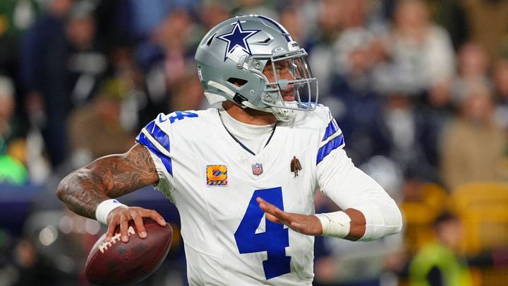 Dallas Cowboys quarterback Dak Prescott looks to pass against the Green Bay Packers; Ross Harried Dallas Cowboys quarterback Dak Prescott looks to pass against the Green Bay Packers; Ross Harried
