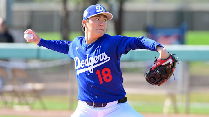 Feb 17, 2026; Glendale, AZ, USA; Los Angeles Dodgers pitcher Yoshinobu Yamamoto (18) throws during a Spring Training workout at Camelback Ranch. Mandatory Credit: Matt Kartozian-Imagn Images