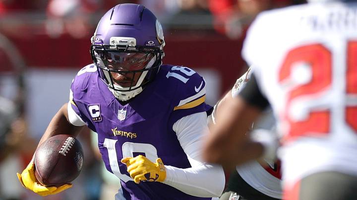 Sep 27, 2026; Tampa, Florida, USA; Minnesota Vikings wide receiver Justin Jefferson (18) carries the ball against the Tampa Bay Buccaneers during the first quarter at Raymond James Stadium. Mandatory Credit: Matt Pendleton-Imagn Images Sep 27, 2026; Tampa, Florida, USA; Minnesota Vikings wide receiver Justin Jefferson (18) carries the ball against the Tampa Bay Buccaneers during the first quarter at Raymond James Stadium. Mandatory Credit: Matt Pendleton-Imagn Images