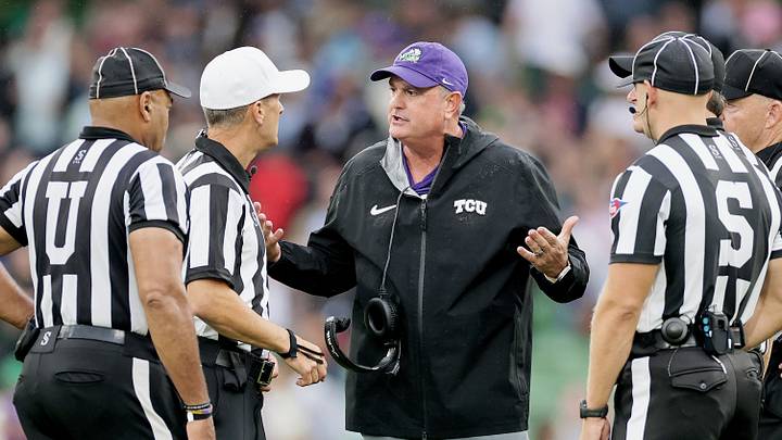 TCU Horned Frogs head coach Sonny Dykes has a discussion with the officiating crew in the first half against the North Carolina Tar Heels at Aviva Stadium. TCU Horned Frogs head coach Sonny Dykes has a discussion with the officiating crew in the first half against the North Carolina Tar Heels at Aviva Stadium.