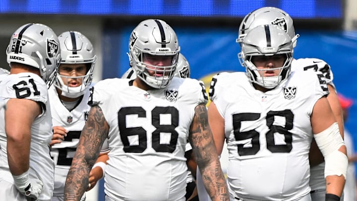 Oct 20, 2024; Inglewood, California, USA; Las Vegas Raiders linemen Jordan Meredith (61), Andre James (68) and Jackson Powers-Johnson (58) during an NFL game against the Los Angeles Rams at SoFi Stadium. Mandatory Credit: Robert Hanashiro-Imagn Images Oct 20, 2024; Inglewood, California, USA; Las Vegas Raiders linemen Jordan Meredith (61), Andre James (68) and Jackson Powers-Johnson (58) during an NFL game against the Los Angeles Rams at SoFi Stadium. Mandatory Credit: Robert Hanashiro-Imagn Images