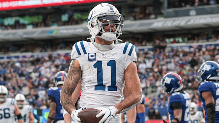 Dec 29, 2024; East Rutherford, New Jersey, USA; Indianapolis Colts wide receiver Michael Pittman Jr. (11) celebrates his touchdown during the second half against the New York Giants at MetLife Stadium. Mandatory Credit: Vincent Carchietta-Imagn Images Dec 29, 2024; East Rutherford, New Jersey, USA; Indianapolis Colts wide receiver Michael Pittman Jr. (11) celebrates his touchdown during the second half against the New York Giants at MetLife Stadium. Mandatory Credit: Vincent Carchietta-Imagn Images