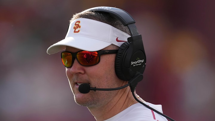 Nov 30, 2024; Los Angeles, California, USA; Southern California Trojans head coach Lincoln Riley reacts against the Notre Dame Fighting Irish in the second half at United Airlines Field at Los Angeles Memorial Coliseum. Mandatory Credit: Kirby Lee-Imagn Images