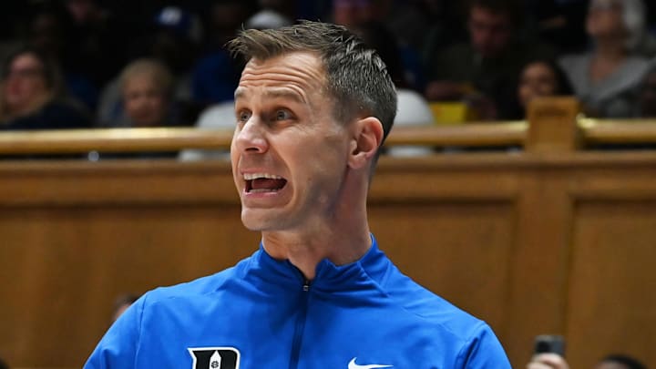 Dec 31, 2025; Durham, North Carolina, USA; Duke Blue Devils head coach Jon Scheyer directs his team during the second half against the Georgia Tech Yellow Jackets at Cameron Indoor Stadium.   The Blue Devils won 85-79.  Mandatory Credit: Rob Kinnan-Imagn Images