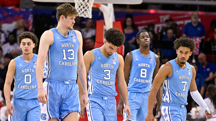 Jan 3, 2026; Dallas, Texas, USA; North Carolina Tar Heels guard Kyan Evans (0) and center Henri Veesaar (13) and guard Derek Dixon (3) and forward Caleb Wilson (8) and guard Seth Trimble (7) come back on the court during the second half against the SMU Mustangs at Moody Coliseum. Mandatory Credit: Jerome Miron-Imagn Images