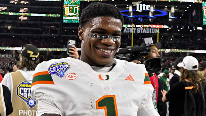 Dec 31, 2025; Arlington, TX, USA; Miami Hurricanes wide receiver Joshisa Trader (1) celebrates after the 2025 Cotton Bowl and quarterfinal game of the College Football Playoff at AT&T Stadium. Mandatory Credit: Jerome Miron-Imagn Images