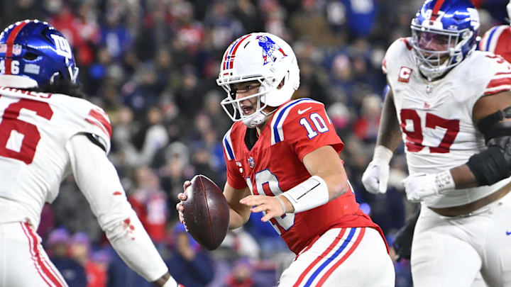 Dec 1, 2025; Foxborough, Massachusetts, USA; New England Patriots quarterback Drake Maye (10) runs the ball against New York Giants linebacker Zaire Barnes (46) during the fourth quarter at Gillette Stadium. Mandatory Credit: Eric Canha-Imagn Images Dec 1, 2025; Foxborough, Massachusetts, USA; New England Patriots quarterback Drake Maye (10) runs the ball against New York Giants linebacker Zaire Barnes (46) during the fourth quarter at Gillette Stadium. Mandatory Credit: Eric Canha-Imagn Images