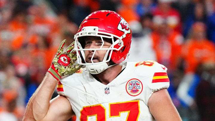 Nov 16, 2025; Denver, Colorado, USA; Kansas City Chiefs tight end Travis Kelce (87) reacts after his touchdown in the fourth quarter against the Denver Broncos at Empower Field at Mile High. Mandatory Credit: Ron Chenoy-Imagn Images