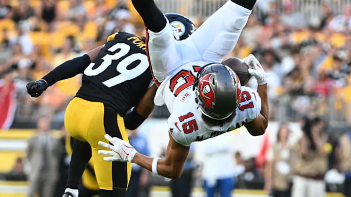 Tampa Bay Buccaneers wide receiver Jalen McMillan makes a catch against Pittsburgh Steelers cornerback Daryl Porter Jr.
