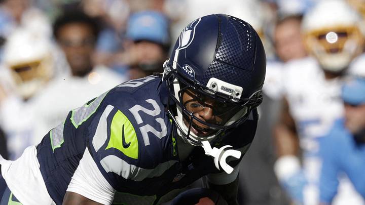 Seattle Seahawks wide receiver Rashid Shaheed carries the ball against Los Angeles Chargers cornerback Cam Hart Seattle Seahawks wide receiver Rashid Shaheed carries the ball against Los Angeles Chargers cornerback Cam Hart