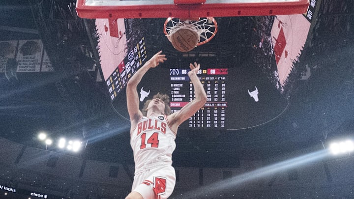 Apr 11, 2025; Chicago, Illinois, USA; Chicago Bulls forward Matas Buzelis (14) dunks the ball against the Washington Wizards during the second half at United Center. Mandatory Credit: David Banks-Imagn Images