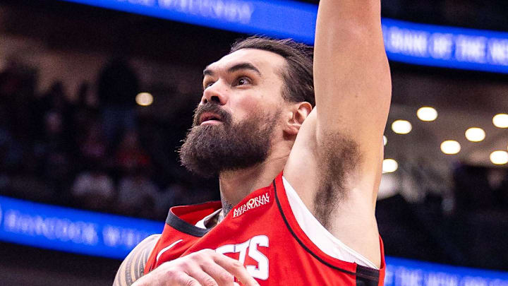 Dec 18, 2025; New Orleans, Louisiana, USA;  Houston Rockets center Steven Adams (12) shoots a hook shot over New Orleans Pelicans guard/forward Saddiq Bey (41) during the second half at Smoothie King Center. Mandatory Credit: Stephen Lew-Imagn Images