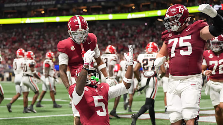Dec 6, 2025; Atlanta, GA, USA; Alabama Crimson Tide wide receiver Germie Bernard (5) celebrates after scoring a touchdown during the fourth quarter against the Georgia Bulldogs during the 2025 SEC Championship game at Mercedes-Benz Stadium. Mandatory Credit: Dale Zanine-Imagn Images Dec 6, 2025; Atlanta, GA, USA; Alabama Crimson Tide wide receiver Germie Bernard (5) celebrates after scoring a touchdown during the fourth quarter against the Georgia Bulldogs during the 2025 SEC Championship game at Mercedes-Benz Stadium. Mandatory Credit: Dale Zanine-Imagn Images