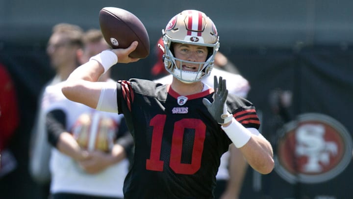 San Francisco 49ers quarterback Mac Jones (10) participates in a passing drill during an OTA at Levi's Stadium.