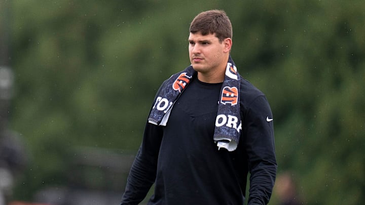 Cincinnati Bengals defensive end Trey Hendrickson (91) watches the defensive line run a drill at Cincinnati Bengals training camp on the Kettering Health Practice Fields in Cincinnati on Sunday, July 28, 2024.