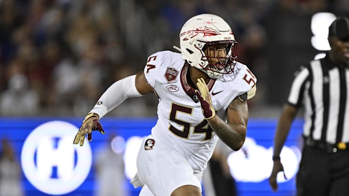 Sep 28, 2024; Dallas, Texas, USA; Florida State Seminoles defensive lineman Byron Turner Jr. (54) in action during the game between the Southern Methodist Mustangs and the Florida State Seminoles at Gerald J. Ford Stadium. Mandatory Credit: Jerome Miron-Imagn Images Sep 28, 2024; Dallas, Texas, USA; Florida State Seminoles defensive lineman Byron Turner Jr. (54) in action during the game between the Southern Methodist Mustangs and the Florida State Seminoles at Gerald J. Ford Stadium. Mandatory Credit: Jerome Miron-Imagn Images