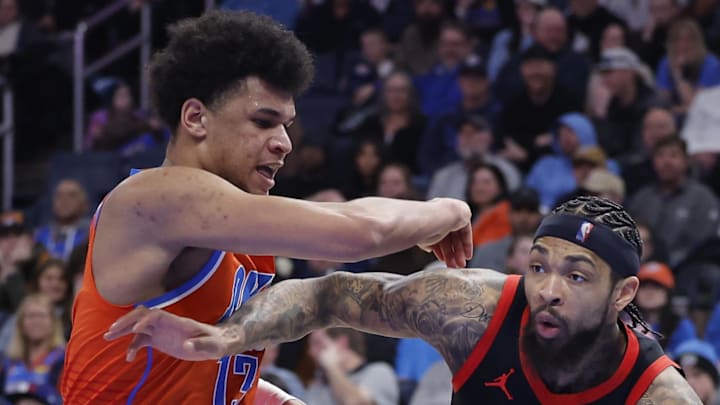 Toronto Raptors forward Brandon Ingram drives to the basket around Oklahoma City Thunder forward Ousmane Dieng.