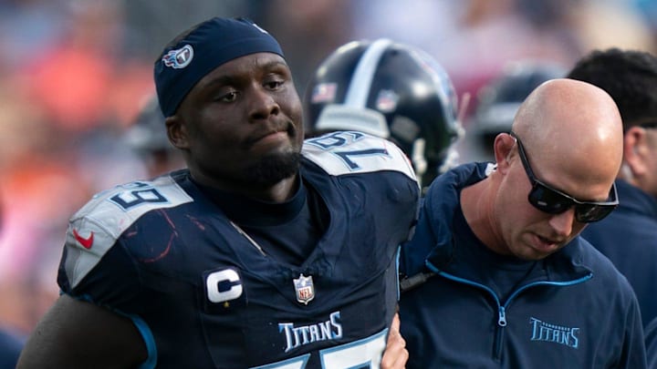 Tennessee Titans center Lloyd Cushenberry III heads to the sideline with an injury against the New England Patriots.