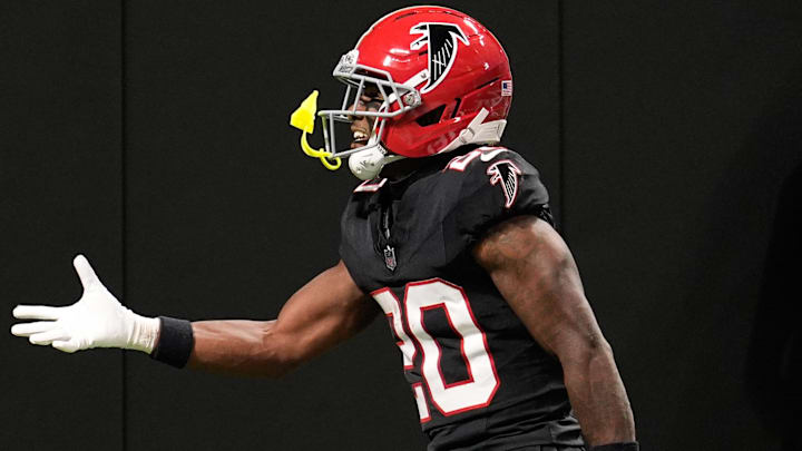 Atlanta Falcons cornerback Dee Alford flips the ball into the stands after an interception against the Buffalo Bills.
