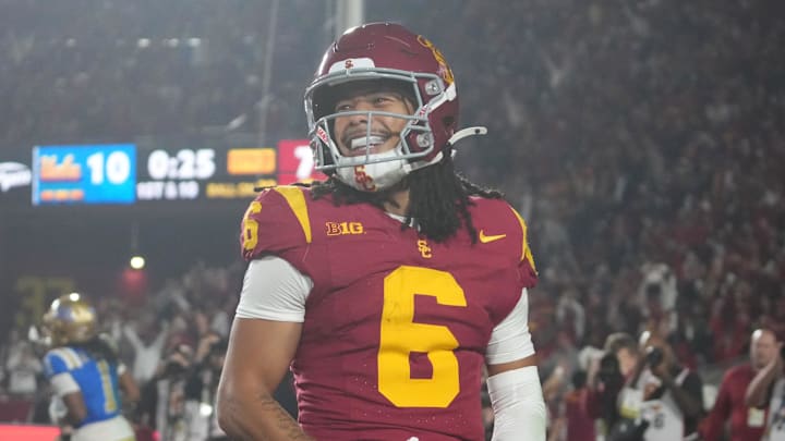 USC Trojans wide receiver Makai Lemon celebrates after catching a 32-yard touchdown pass against the UCLA Bruins. USC Trojans wide receiver Makai Lemon celebrates after catching a 32-yard touchdown pass against the UCLA Bruins.