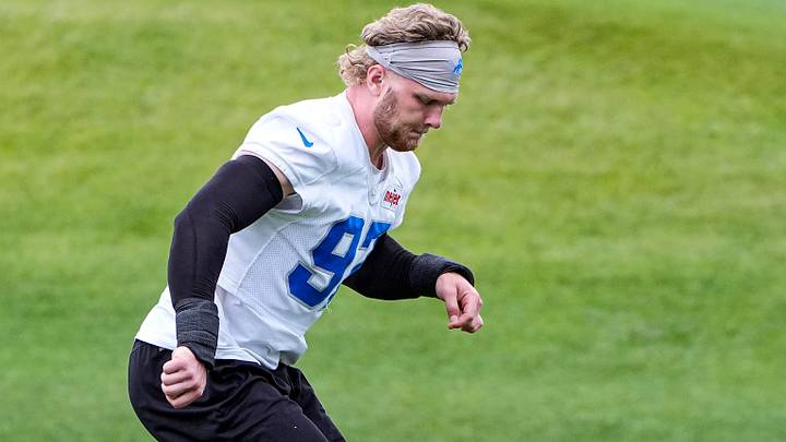 Detroit Lions defensive end Aidan Hutchinson (97) warms up before OTAs at Allen Park Performance Center Detroit Lions defensive end Aidan Hutchinson (97) warms up before OTAs at Allen Park Performance Center