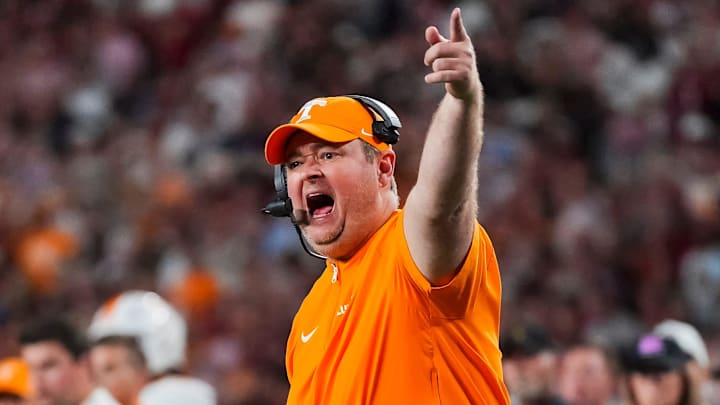 Tennessee coach Josh Heupel points to the running clock while yelling at the referees for a timeout during a college football game between Tennessee and Alabama at Bryant-Denny Stadium in Tuscaloosa, Ala., on Oct. 18, 2025.