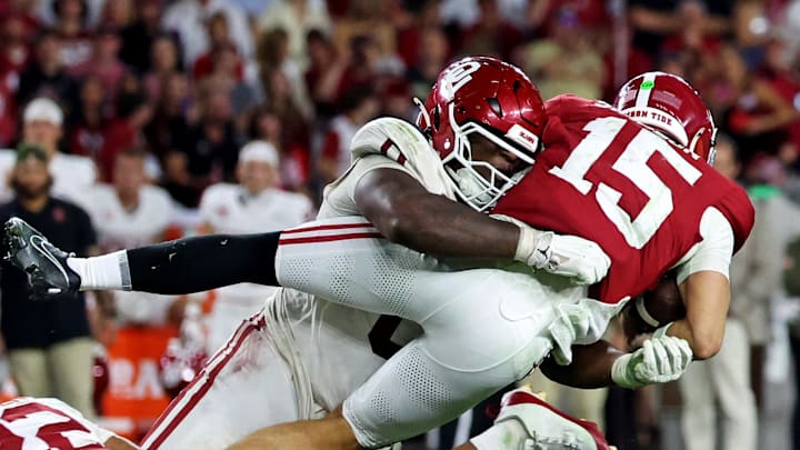 Nov 15, 2025; Tuscaloosa, Alabama, USA; Alabama Crimson Tide quarterback Ty Simpson (15) is tackled by Oklahoma Sooners defensive lineman David Stone (0) during the third quarter at Saban Field at Bryant-Denny Stadium. Mandatory Credit: David Leong-Imagn Images Nov 15, 2025; Tuscaloosa, Alabama, USA; Alabama Crimson Tide quarterback Ty Simpson (15) is tackled by Oklahoma Sooners defensive lineman David Stone (0) during the third quarter at Saban Field at Bryant-Denny Stadium. Mandatory Credit: David Leong-Imagn Images
