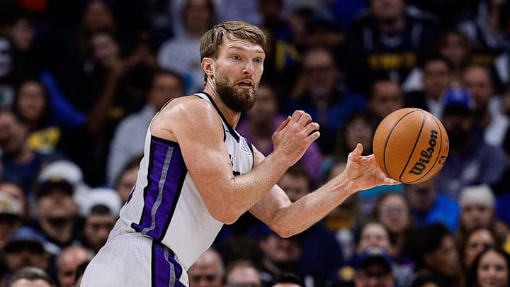 Nov 3, 2025; Denver, Colorado, USA; Sacramento Kings forward Domantas Sabonis (11) keeps the ball inbounds in the third quarter against the Denver Nuggets at Ball Arena. Mandatory Credit: Isaiah J. Downing-Imagn Images