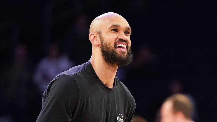 Apr 9, 2026; New York, New York, USA; Boston Celtics guard Derrick White (9) smiles as he warms up before the game against the New York Knicks at Madison Square Garden. Mandatory Credit: Lucas Boland-Imagn Images