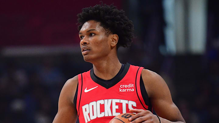 Apr 14, 2024; Los Angeles, California, USA; Houston Rockets forward Amen Thompson (1) controls the ball against the Los Angeles Clippers during the first half at Crypto.com Arena. Mandatory Credit: Gary A. Vasquez-Imagn Images