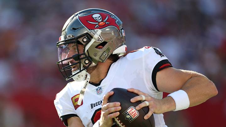 Tampa Bay Buccaneers quarterback Baker Mayfield (6) scrambles with the ball against the Minnesota Vikings Tampa Bay Buccaneers quarterback Baker Mayfield (6) scrambles with the ball against the Minnesota Vikings